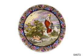 Porcelánový talíř Ranní píseň s vyobrazením podle J. Mánesa, A. Jaroněk, sbírky NMvP, inv. č. 64673. V soupisech s oceněním prodejního sortimentu se tento typ objevuje už před rokem 1927.